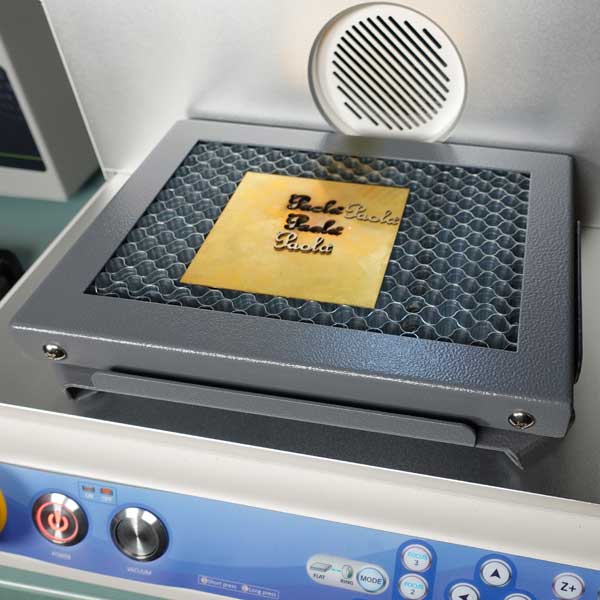 Table for laser cutting of plates